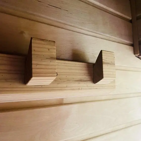 Hooks for towels and sauna panelling