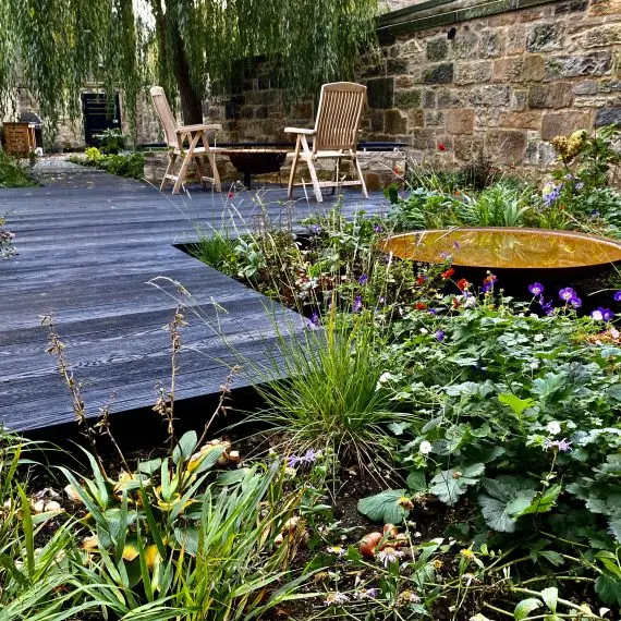 Millboard decking and corten water bowl