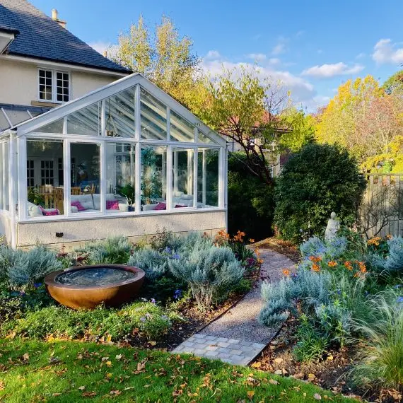 Painted arbour, garden design by Carolyn Grohmann
