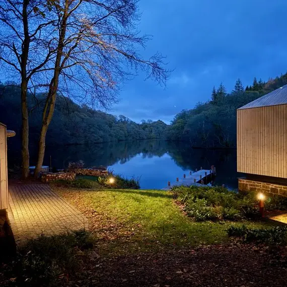 Boathouse and lake at dusk