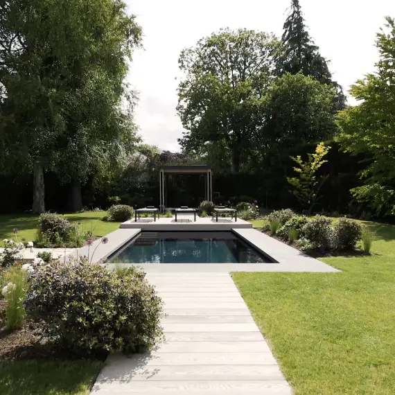 Outdoor swimming pool and pergola